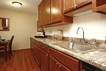 Remodeled Apartment Kitchens At Villages on McKnight Apartments In North St Paul, MN